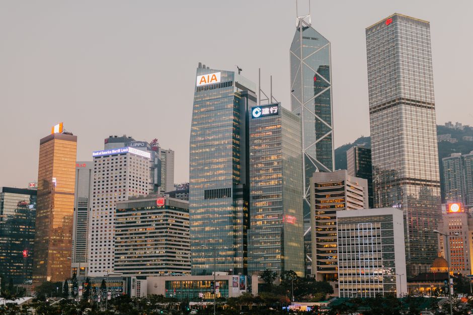 Stunning view of Hong Kong's iconic skyscrapers during twilight, capturing the city's urban glow.